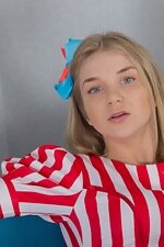 Kristinka undresses out of her red striped dress 